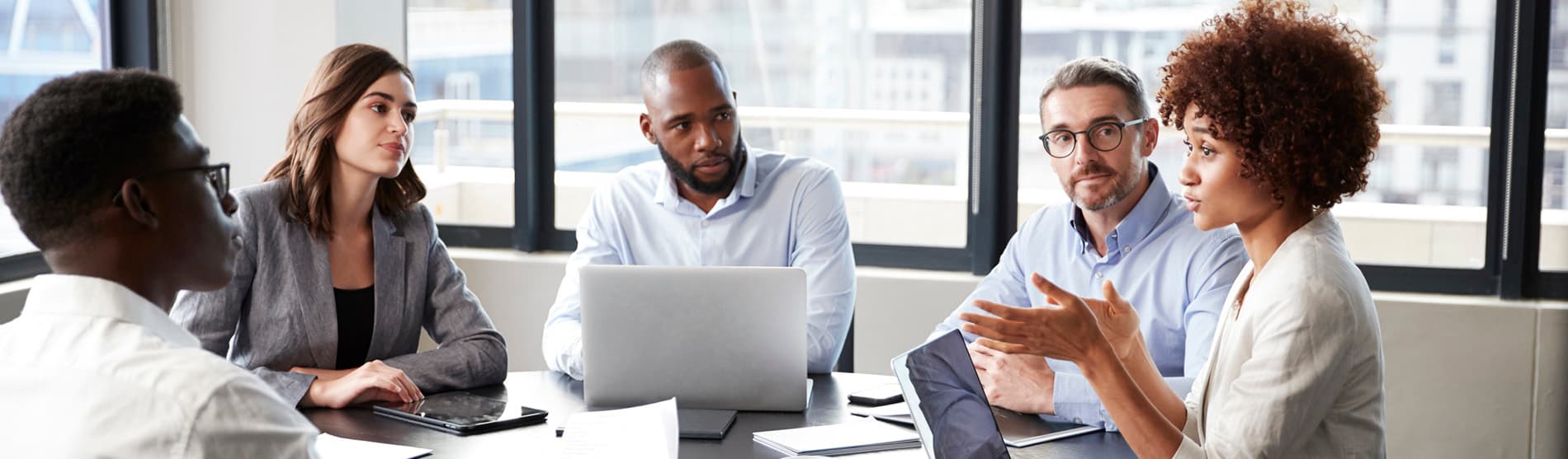 professionals at a conference table