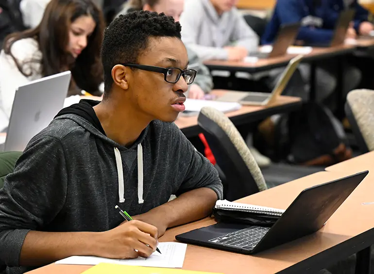 male accounting student in class